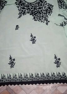 Elegant Embroidered unstitch material.