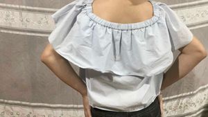 Cute baby blue Ruffle Top