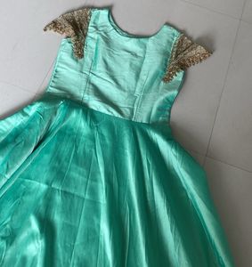 Beautiful Pista Colour Gown With Sleeves Pattern