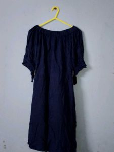 A Beautiful Western Dress With Red Roses