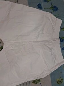 White Straight Pant With Embroidery Work At Bottom