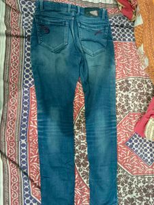 Distressed Blue Jeans