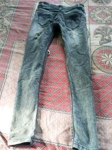 Ripped Knee Jeans