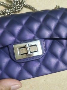 Purple Quilted Jelly Chain Bag...