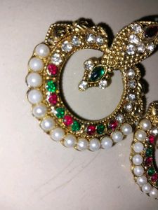 Traditional earrings with green and red pretty diamonds with white pearl