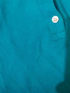 Turquoise Sleeveless Polo