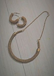 Golden Earrings And Necklace