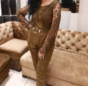 Step Sleeve Jumpsuit With Crochet Jacket.