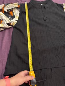 Unique Black Blouse with Patterned Sleeves