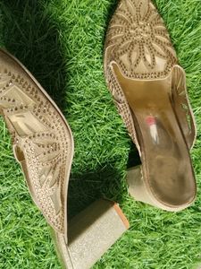 Woman Golden Heels