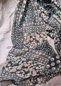 Black ruffle georgette gown.