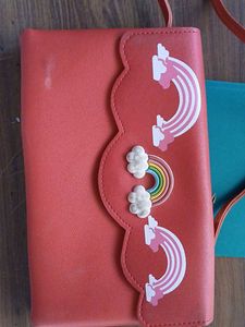 Red Sling Bag With Rainbow Design
