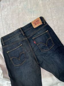 Levi&#39;s 585 Mid Rise Skinny Jeans