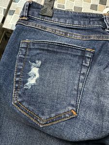 Distressed Denim Jeans