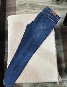 Distressed Denim Jeans