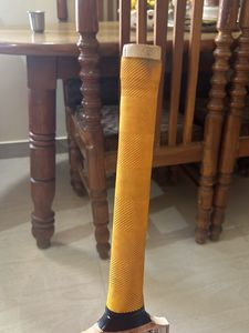 Red Ball Tennis Bat