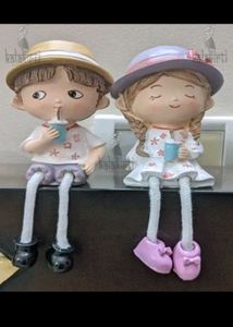 Sipper Unique Couple Hanging Legs Statues
