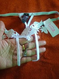 Unisex Lacy White Thong with Charm
