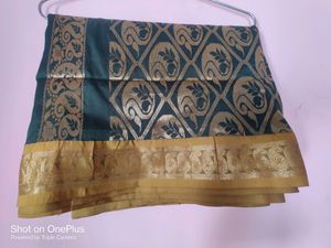 Selling A Beautiful Green Banarsi Saree