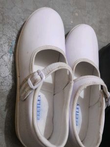 black and white school shoes