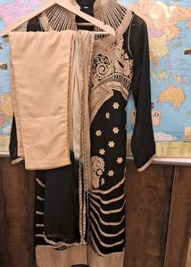 Party Wear Suit With Heavy Golden Emb