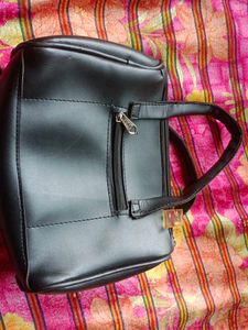 Chic Black Handbag with Bow Detail