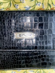 A Black Slingbag For Women