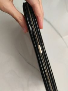 black wallet with press lock
