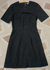 "Classic Black Knee-Length Dress"