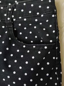 A beautiful black hipster shorts with polka dots.