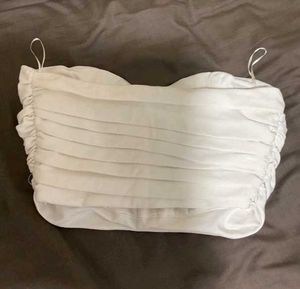 White Ruffled Sleeveless Top