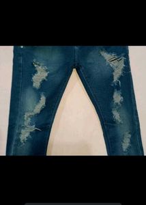 Ripped Blue Denim Jeans