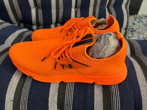 Orange sports shoes for mens