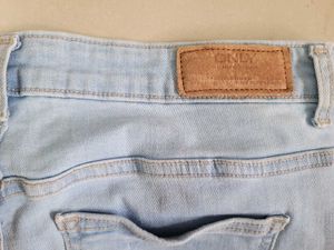 Ripped Light Wash Denim Jeans