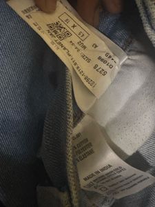 Denim Jeans with a pen mark kn right po