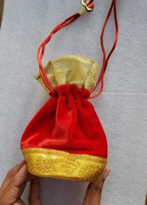 Price DropVelvet Red Wedding Potli With Golden Lac