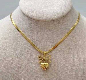 Trendy Gold Plated Necklace With Bow And Heart🎀