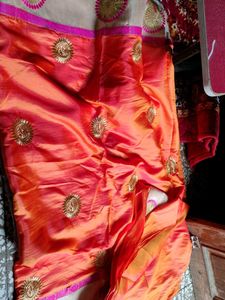 Elegant Orange Embroidered Saree