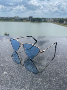 Blue-Tinted Triangle Frame Sunglasses