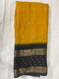 Elegant Yellow Saree with Black Border