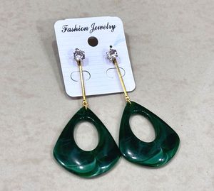 green and royal blue earrings