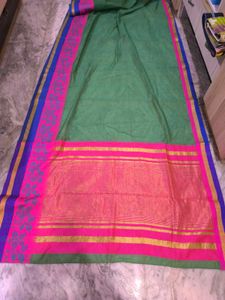 Green saree with multicolour details and glitter s