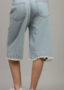 Distressed Denim Capri Pants