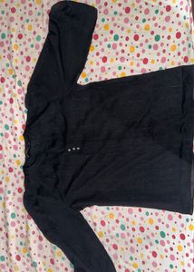 black top with ruffles sleeves