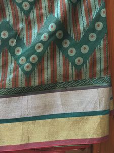 Green Net Saree With Silver And Red Border