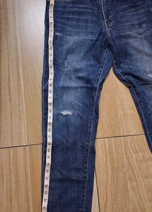 Distressed Blue Denim Jeans