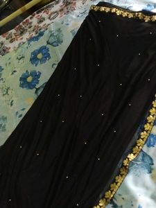 Black Saree With Matching Ear Rings