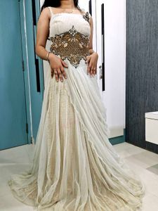 Silver Heavy Work Long Full Flair Gown For Women.