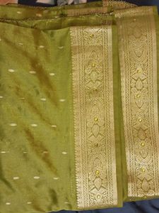 Olive green kanjeevaram saree