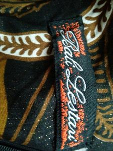 Beautiful Black Printed Kurthi With Golden Self Lines